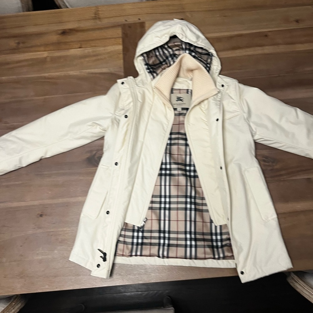 Authentic Burberry London mid weight cream colored coat with hood NWOT.